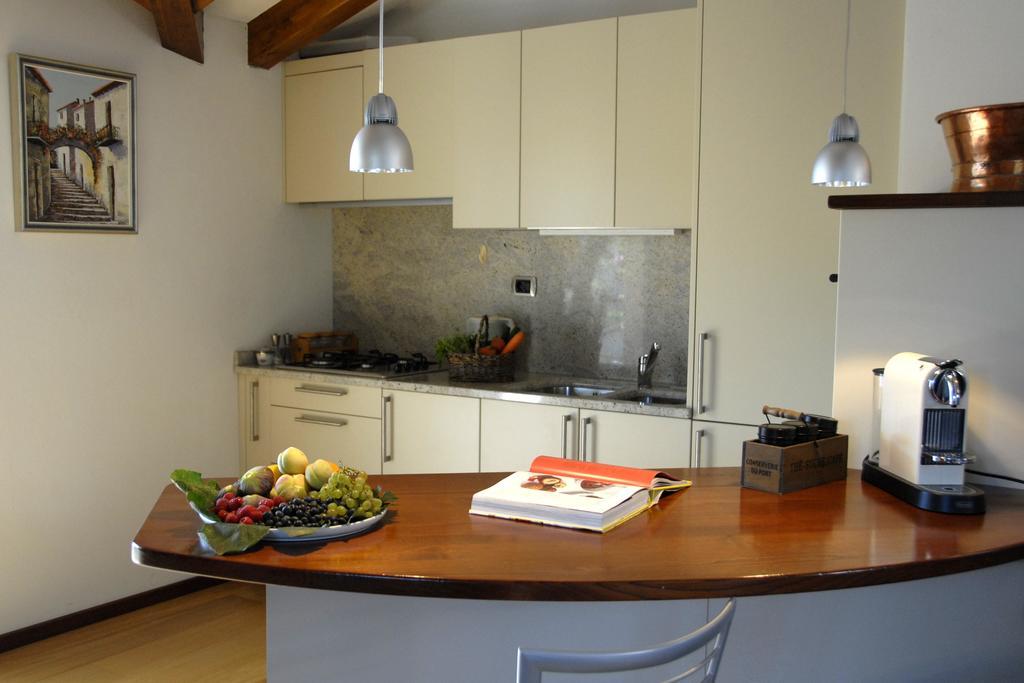 Alveluu Ristorante E Suites Tremezzo Zimmer foto